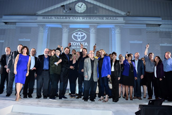 Owners receive ceremonial keys to the Mirai hydrogen fuel cell car at Toyota’s “Back to the Future” themed event on Tuesday, Oct. 20, 2015, in West Hollywood, Calif. (Photo by Jordan Strauss/Invision for Toyota/AP Images)